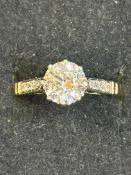 9ct gold ring set with large solitaire white stone