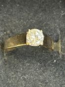 9ct gold ring set with large solitaire white stone