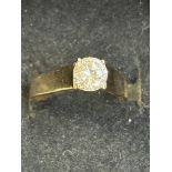 9ct gold ring set with large solitaire white stone