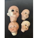 4 Old dolls head