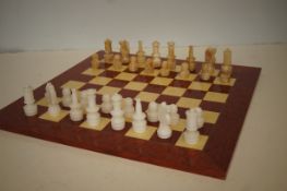 Good quality chess board with onyx chess pieces