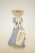 Large Nao figure of a seated lady Height 30 cm