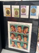 Large stamp album to include stamps from Elvis, Wi