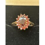 9ct Gold ring set with red garnets Size M 2.8g