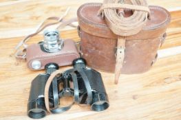 Cased binoculars & Halina vintage camera