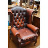 Chesterfield wing back chair - rips to leather on