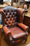 Chesterfield wing back chair - rips to leather on