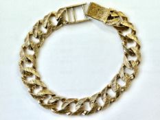 9ct gold thick and heavy gents curb bracelet.