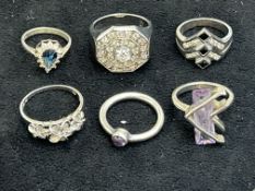 Six silver rings