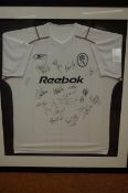 Framed team signed Bolton Wanderers football shirt