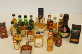 A collection of mainly miniature whiskeys to include Petite, Liquorelle, Moet and Chandon