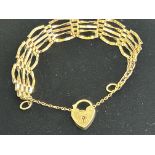 9ct gold gate bracelet with safety chain and heart