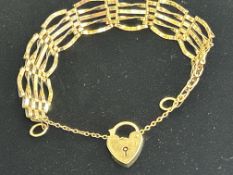 9ct gold gate bracelet with safety chain and heart