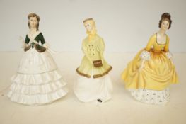 Two Royal Worcester figurines together with a Royal Doulton figurine