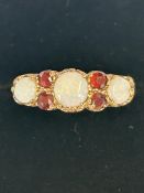 9ct Gold ring set with opals & rubies Size Q 2.2g