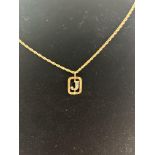 9ct gold chain and pendant, jewel colour pendant s
