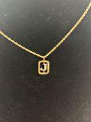 9ct gold chain and pendant, jewel colour pendant s