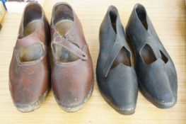 Two pairs of clogs