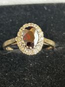 9CT gold ring set with garnets & CZ Size K