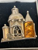 silver and amber brooch