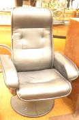 A large heated swivel massage chair