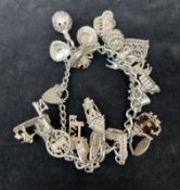 Silver charm bracelet 97g 21 charms