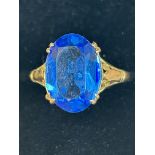 9ct Gold ring set with large blue gem stone Weight