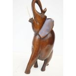 A large African carved elephant, heavy dense wood,