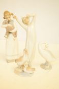 Lladro girl with lamb, Lladro swan and two others