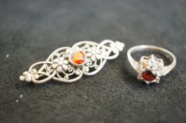 Silver ring set with red stone & matching brooch s