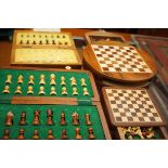 Four miniature chess sets