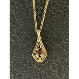 9ct Gold chain & pendant, pendant set with garnet