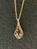 9ct Gold chain & pendant, pendant set with garnet