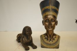 Heavy bronzed figure of an Egyptian together with