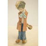 A large Lladro child clown, 31cm