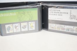An album of British presentation pack stamps, appr