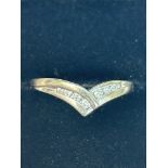 9ct White gold wish bone ring set with 7 small dia