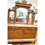 A large early 20th century mirrored dresser