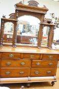 A large early 20th century mirrored dresser