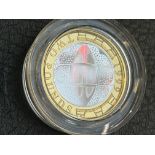 925 Silver coin plated with .999 fine gold united