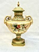 Royal Worcester 1572 twin handled lidded vase, hand painted decoration - early staple restoration to