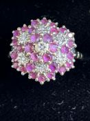 9ct Gold rubies and diamonds cluster ring, size O,