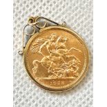 1958 mounted full sovereign, total weight 9.7grams