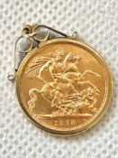 1958 mounted full sovereign, total weight 9.7grams