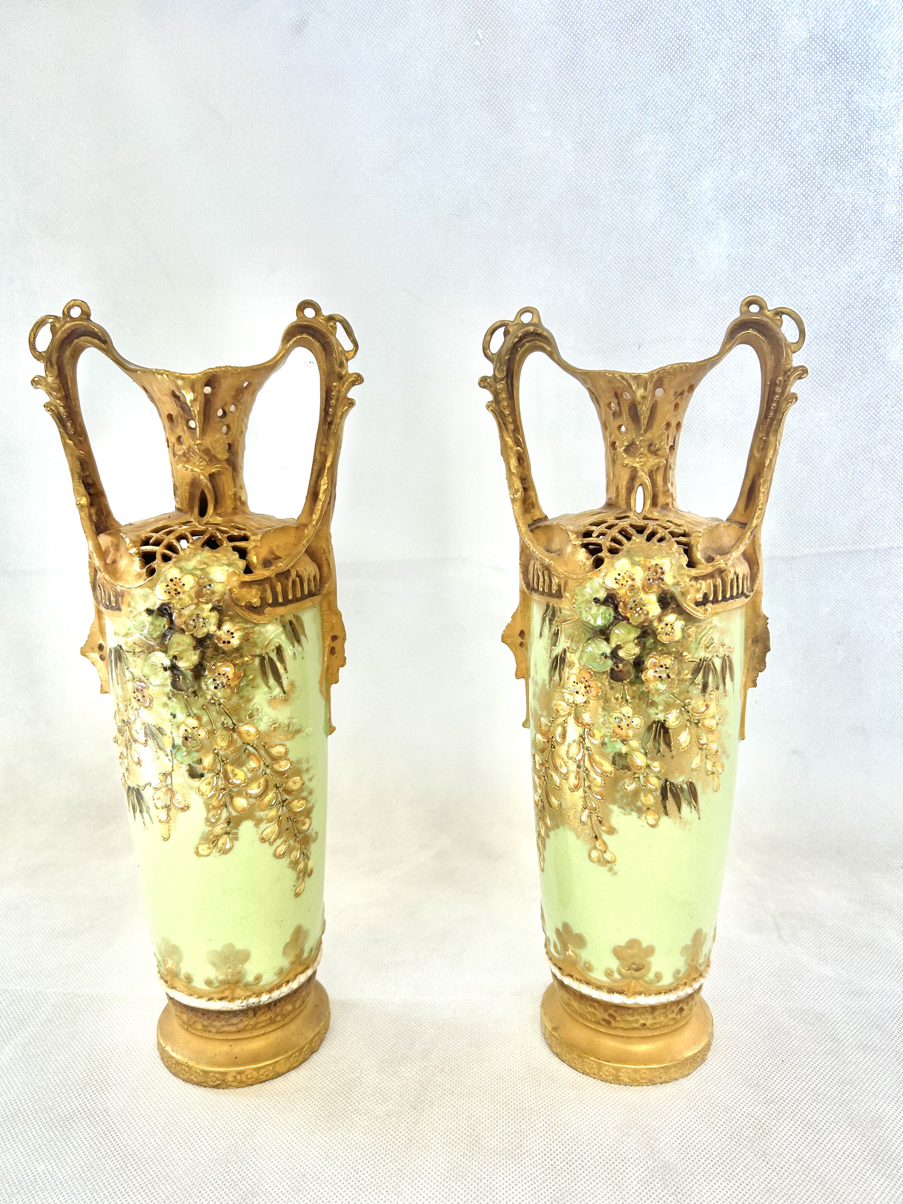 Pair of early 20th century gilt & green painted tw