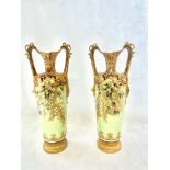 Pair of early 20th century gilt & green painted tw
