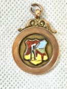 9ct Gold fob set with enamel dated 1914 Weight 7.7