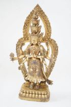 Gilt bronze tibetan buddha sculpture with inset st