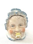 Possibly German porcelain babies head lidded pot H