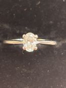 Oval diamond ring set in platinum. Size I 0.37ct d